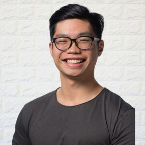 A profile photo of Oscar Lau, a registered massage therapist at Runway Health which has locations in Markham and Newmarket.